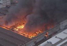 Incêndio de grandes proporções atinge distribuidora de tintas