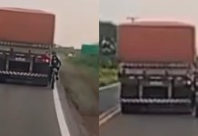 Ciclista é flagrado em situação de risco ao seguir atrás de carreta na PA-252, em Moju